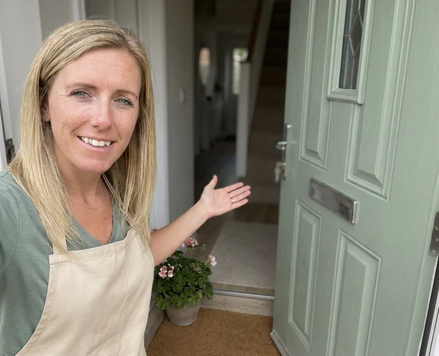 Chantelle Barratt welcoming a customer at the door in Derby