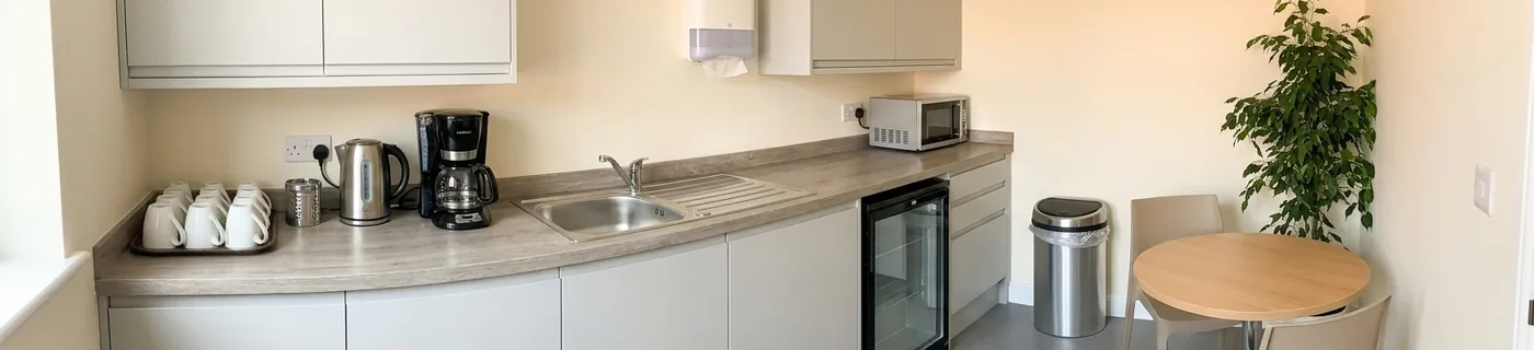 Clean staff break room with tidy worktops in a Derby workplace